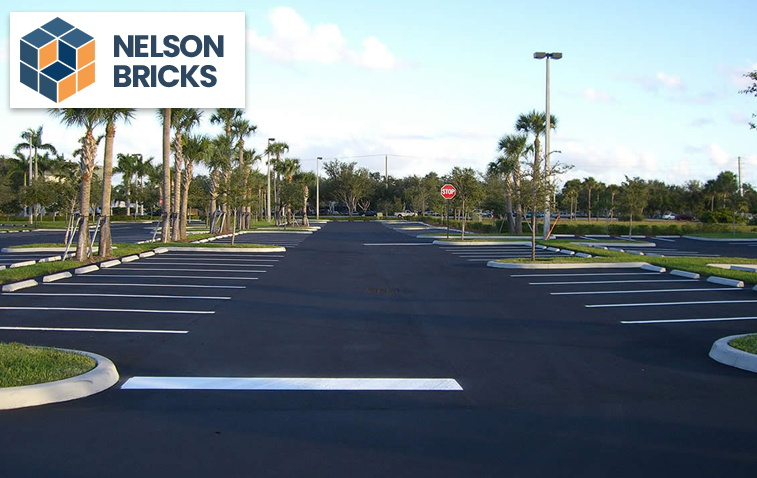 Asphalt parking lot with proper drainage and design